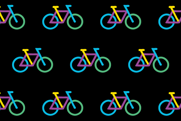 A repetitive background pattern featuring The Bike Project's colourful logo