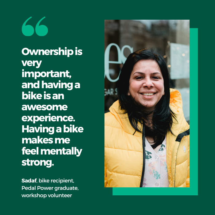 A smiling woman with her quote "Ownership is very important, and having a bike is an awesome experience. Having a bike makes me feel mentally strong."